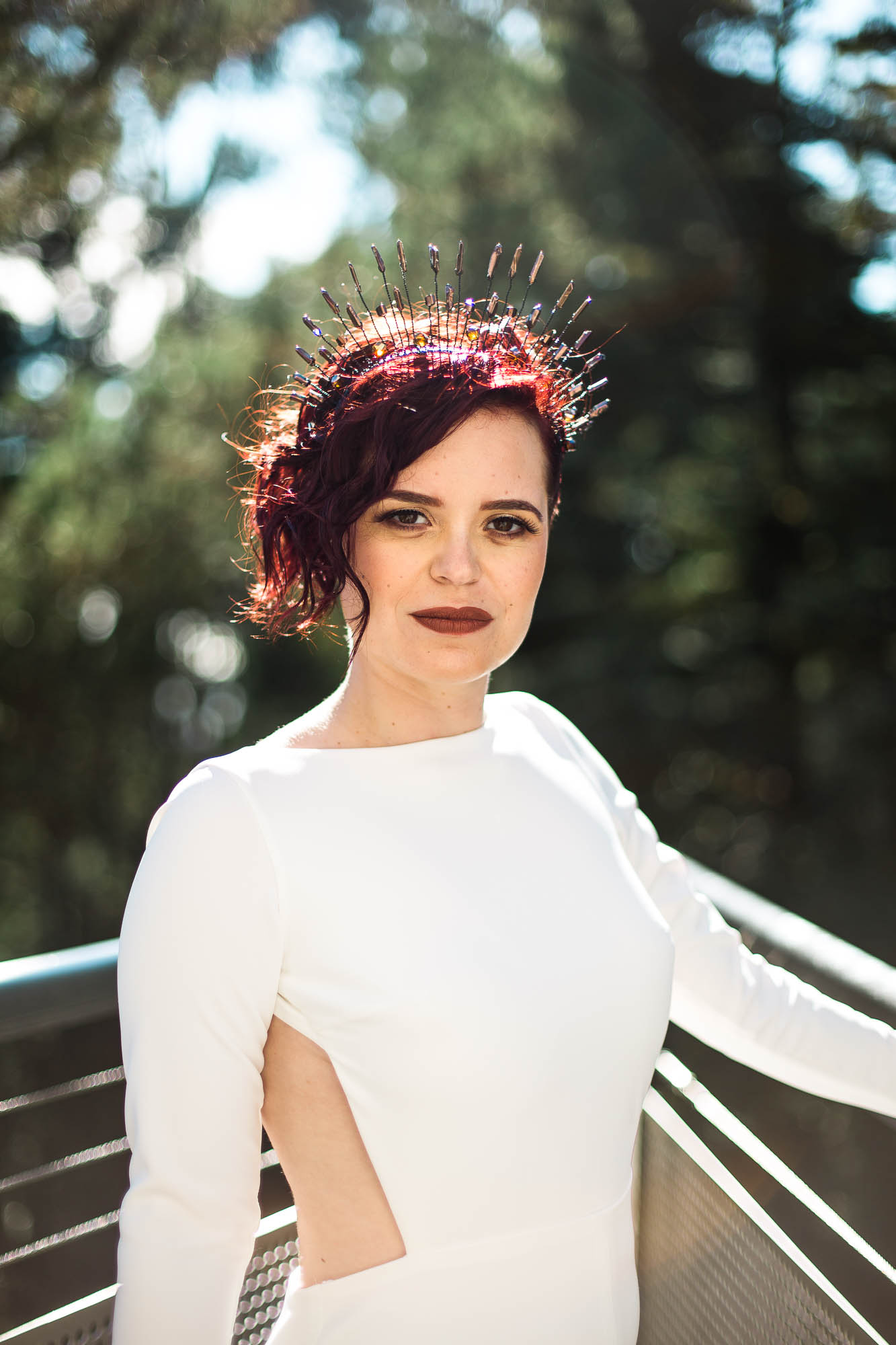 Crowns, pink flowers, & the cosmos at this Space Center wedding