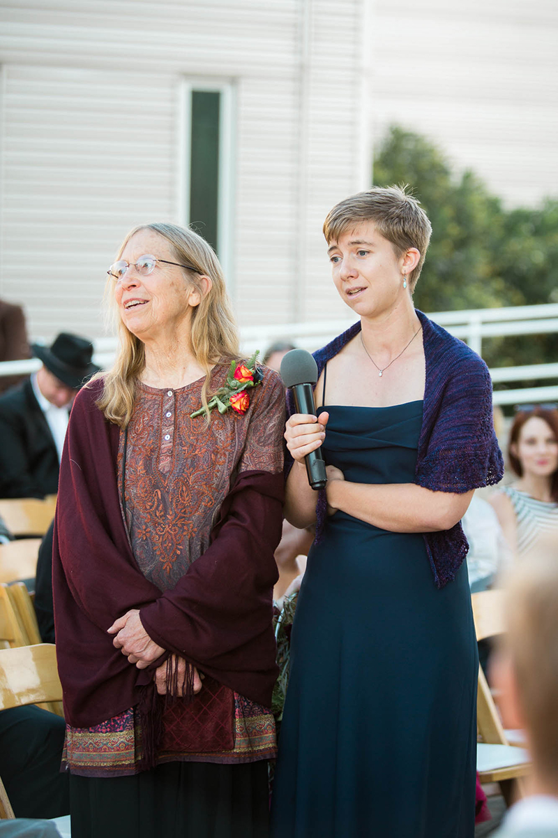 Crowns, pink flowers, & the cosmos at this Space Center wedding