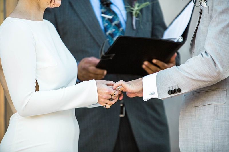 Crowns, pink flowers, & the cosmos at this Space Center wedding