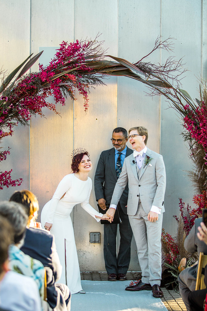 Crowns, pink flowers, & the cosmos at this Space Center wedding