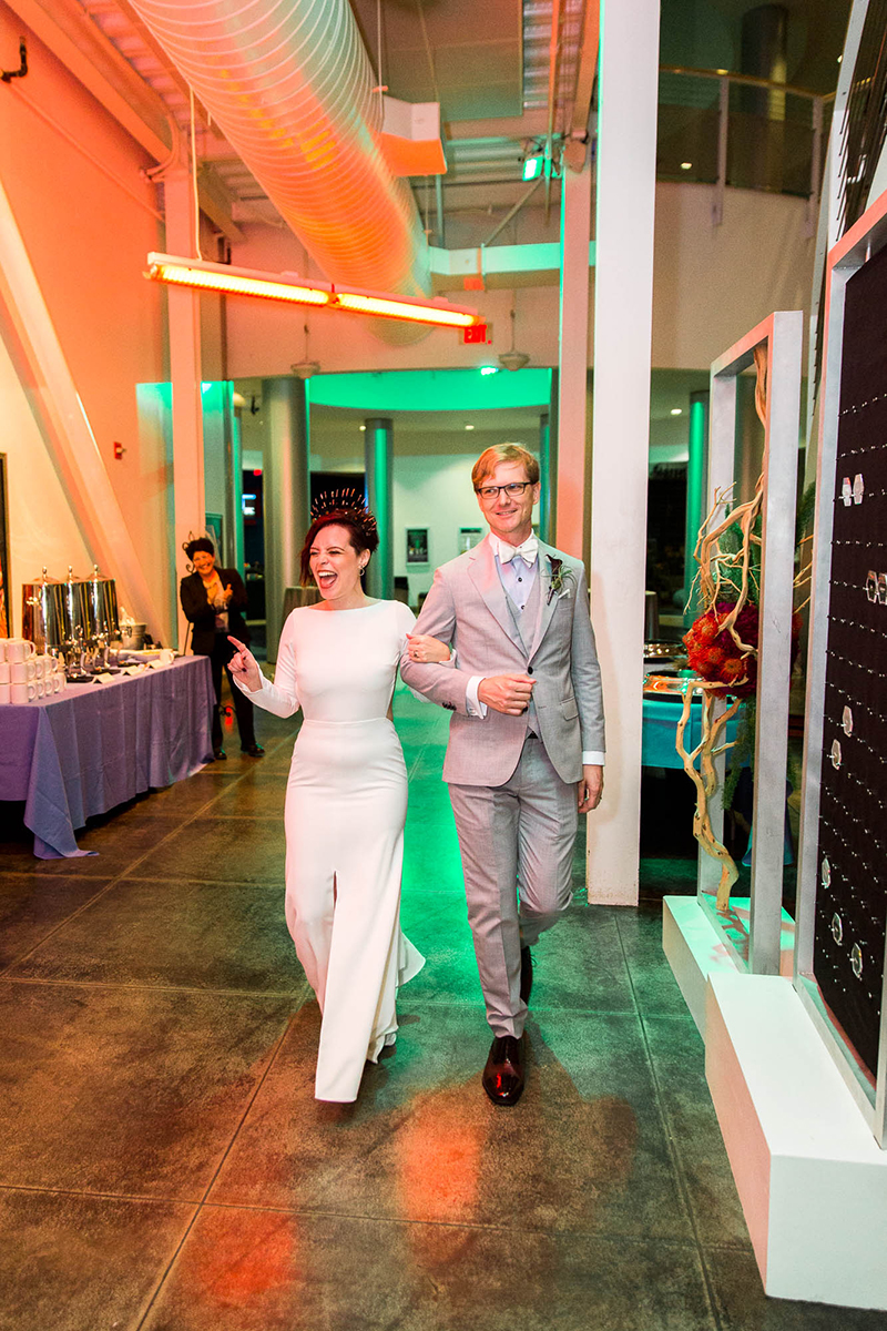 Crowns, pink flowers, & the cosmos at this Space Center wedding