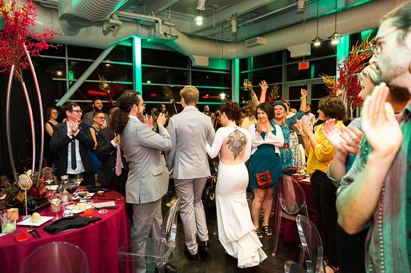 Crowns, pink flowers, & the cosmos at this Space Center wedding