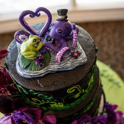 Arcade games & epic foliage at this whimsical green & purple wedding