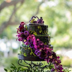 Arcade games & epic foliage at this whimsical green & purple wedding