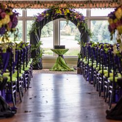 Arcade games & epic foliage at this whimsical green & purple wedding