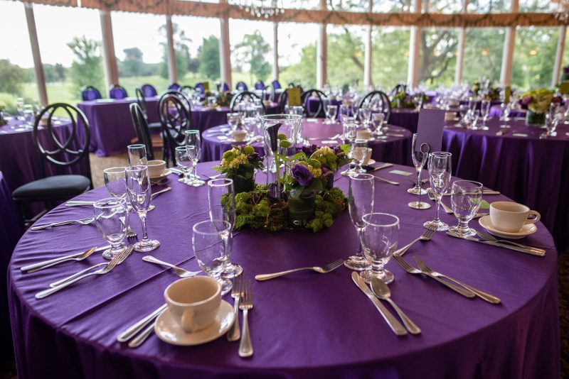 Arcade games & epic foliage at this whimsical green & purple wedding