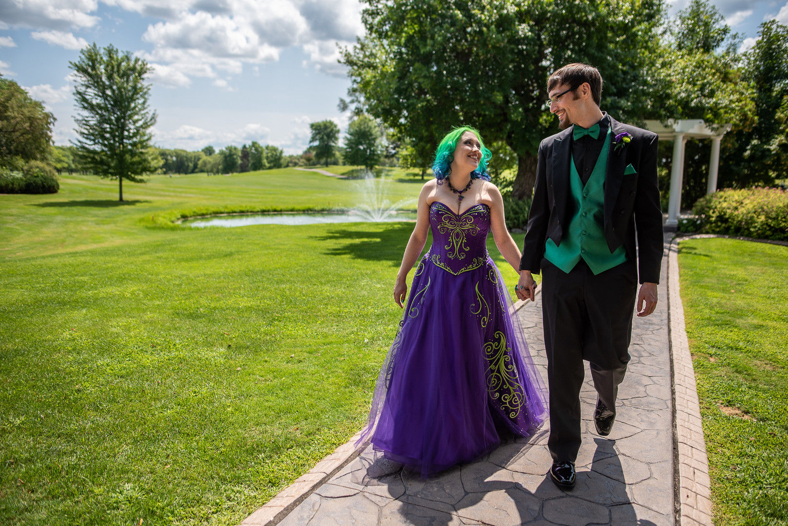 Arcade games & epic foliage at this whimsical green & purple wedding