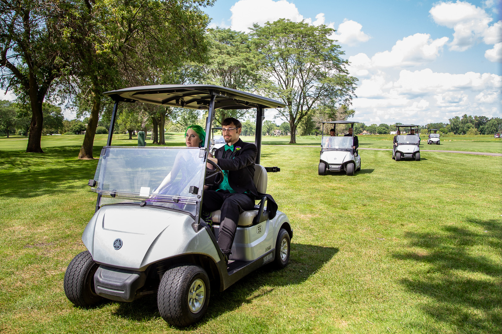 Arcade games & epic foliage at this whimsical green & purple wedding