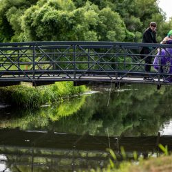 Arcade games & epic foliage at this whimsical green & purple wedding