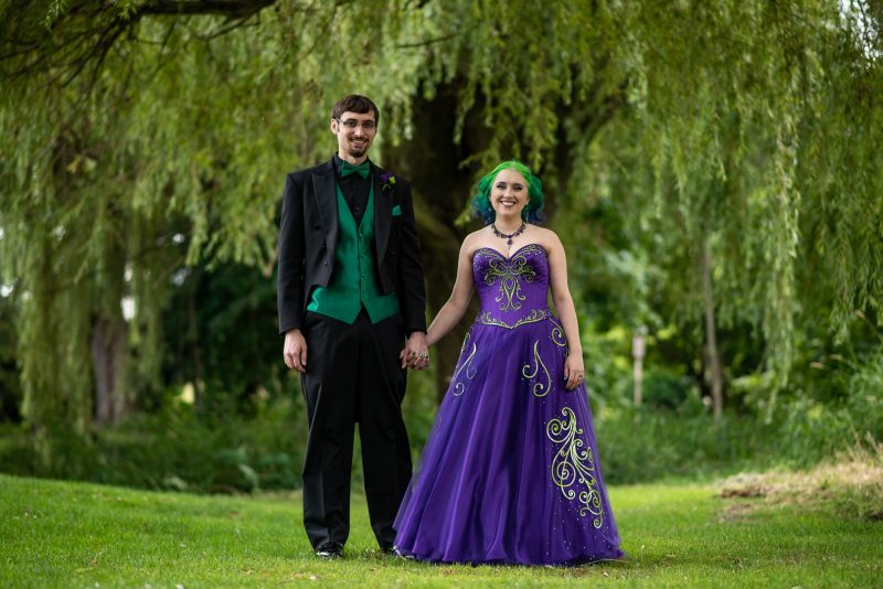Arcade games & epic foliage at this whimsical green & purple wedding