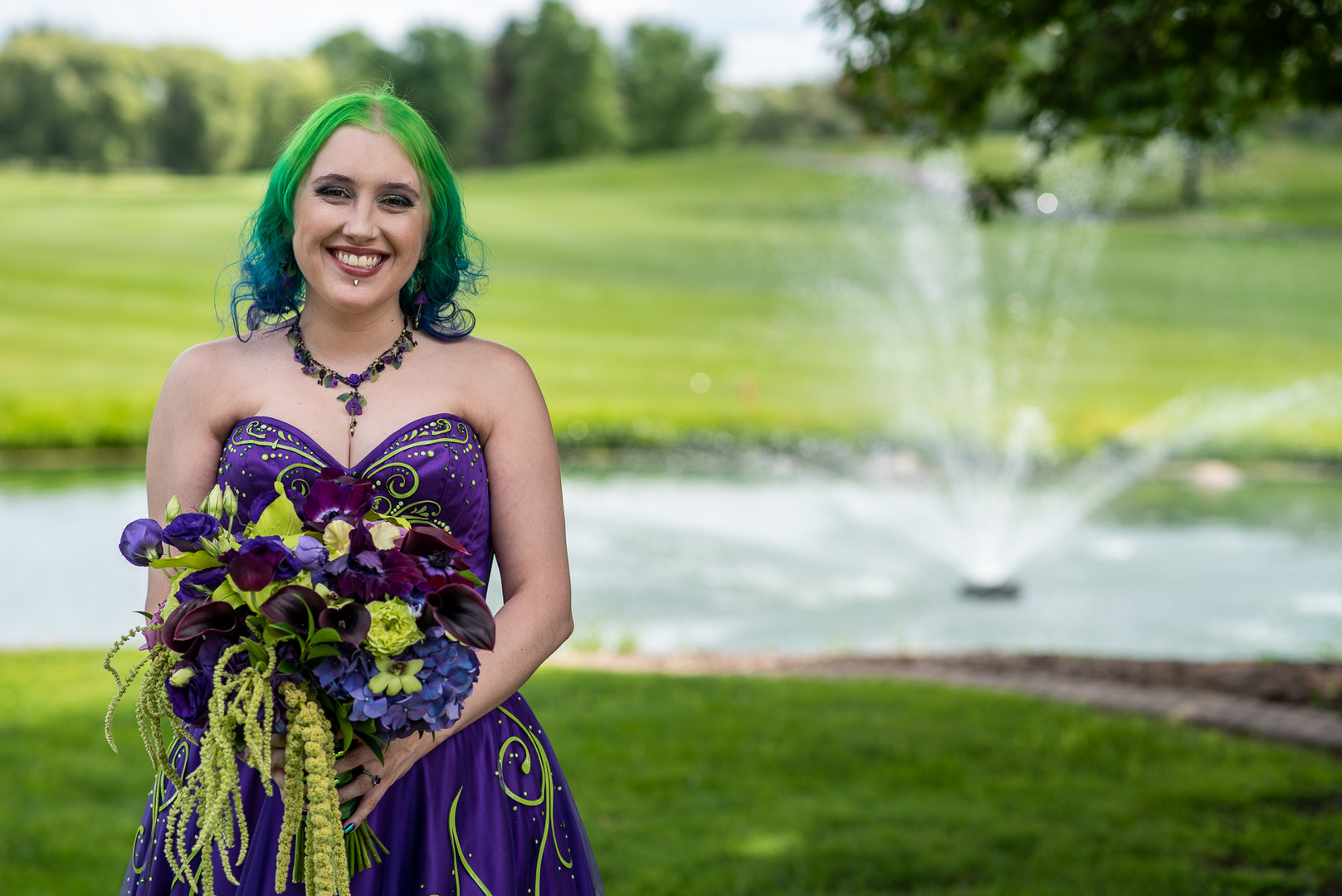 Arcade games & epic foliage at this whimsical green & purple wedding