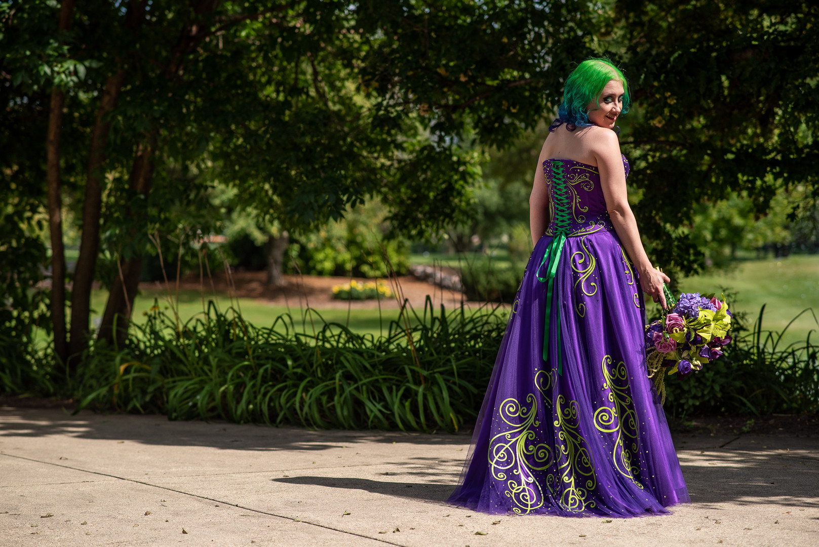 Arcade games & epic foliage at this whimsical green & purple wedding