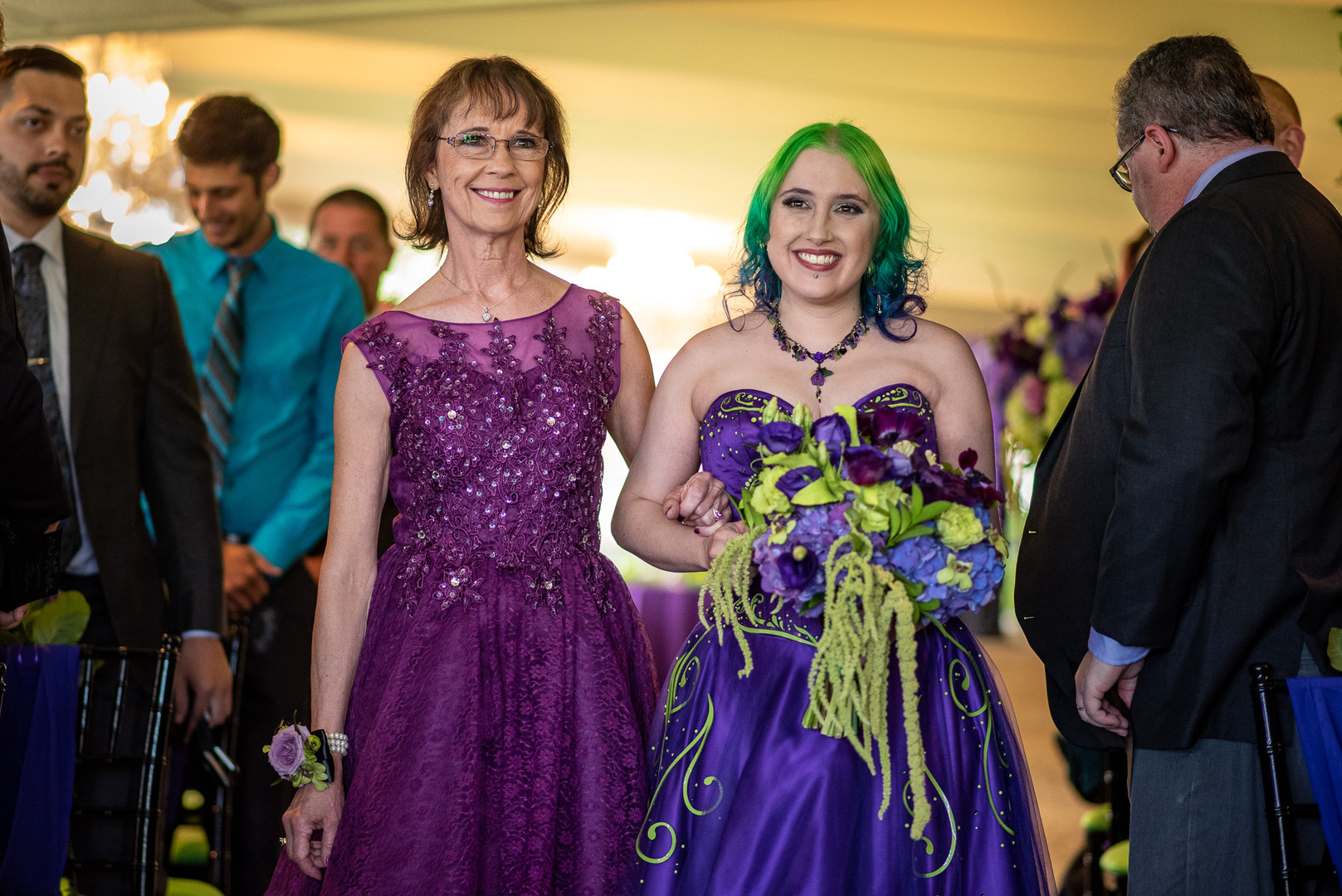 Arcade games & epic foliage at this whimsical green & purple wedding