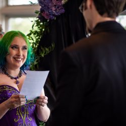 Arcade games & epic foliage at this whimsical green & purple wedding
