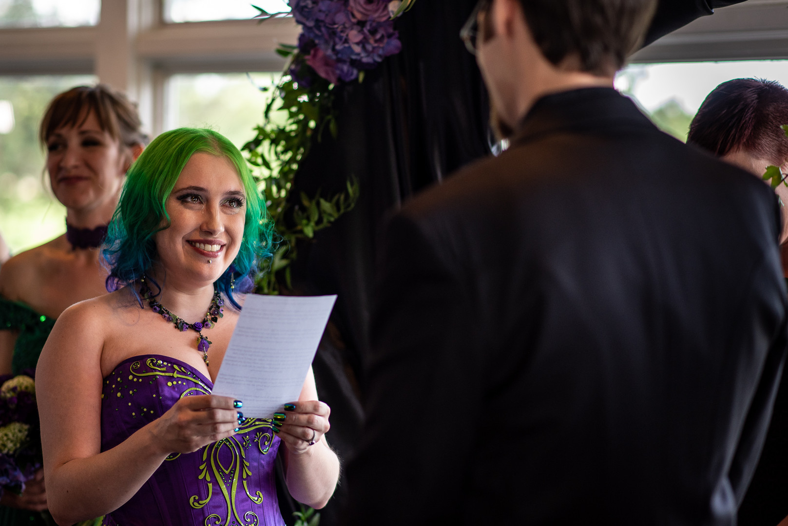 Arcade games & epic foliage at this whimsical green & purple wedding