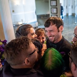 Arcade games & epic foliage at this whimsical green & purple wedding