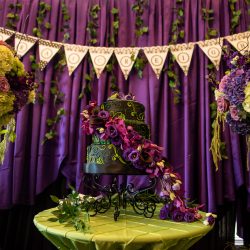 Arcade games & epic foliage at this whimsical green & purple wedding