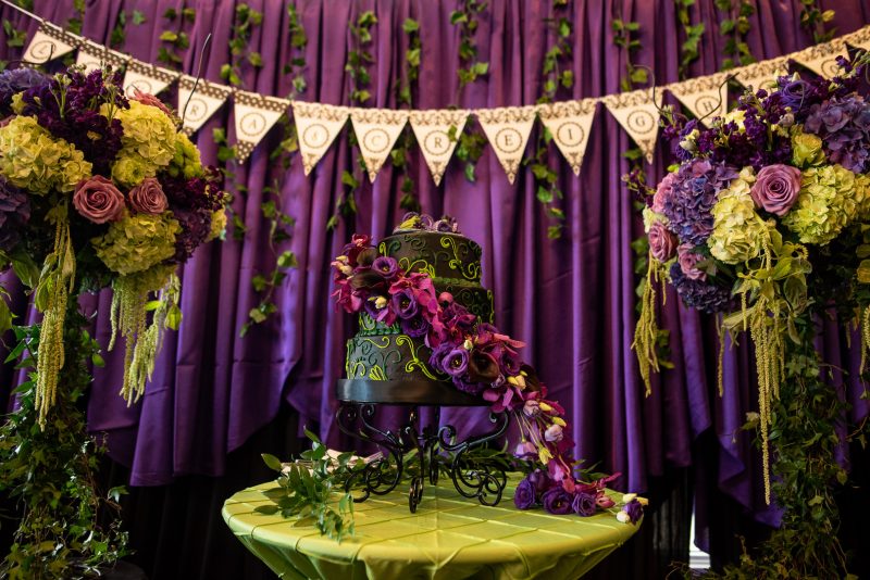 Arcade games & epic foliage at this whimsical green & purple wedding