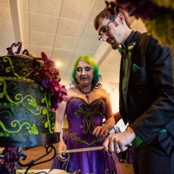 Arcade games & epic foliage at this whimsical green & purple wedding