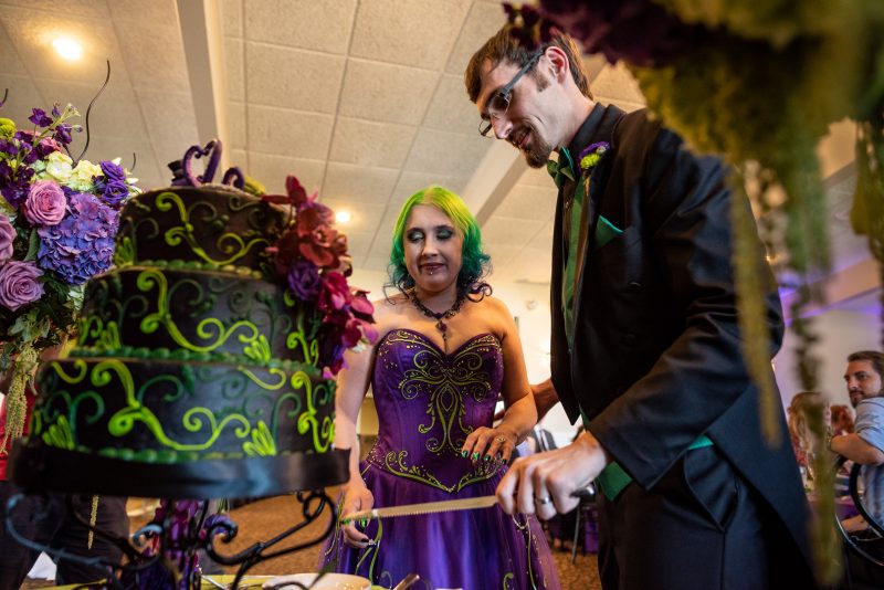 Arcade games & epic foliage at this whimsical green & purple wedding