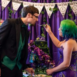 Arcade games & epic foliage at this whimsical green & purple wedding