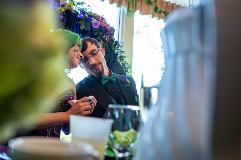 Arcade games & epic foliage at this whimsical green & purple wedding