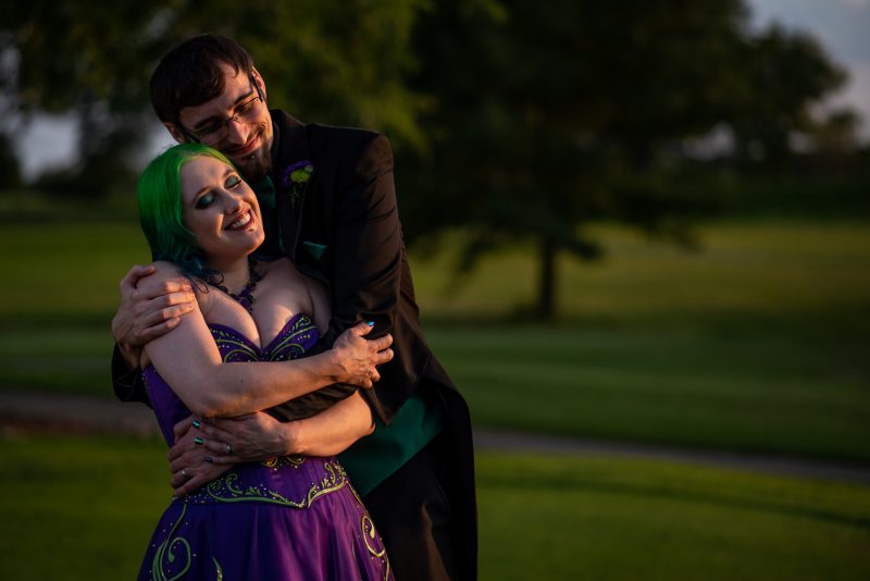 Arcade games & epic foliage at this whimsical green & purple wedding