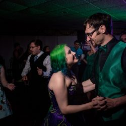 Arcade games & epic foliage at this whimsical green & purple wedding