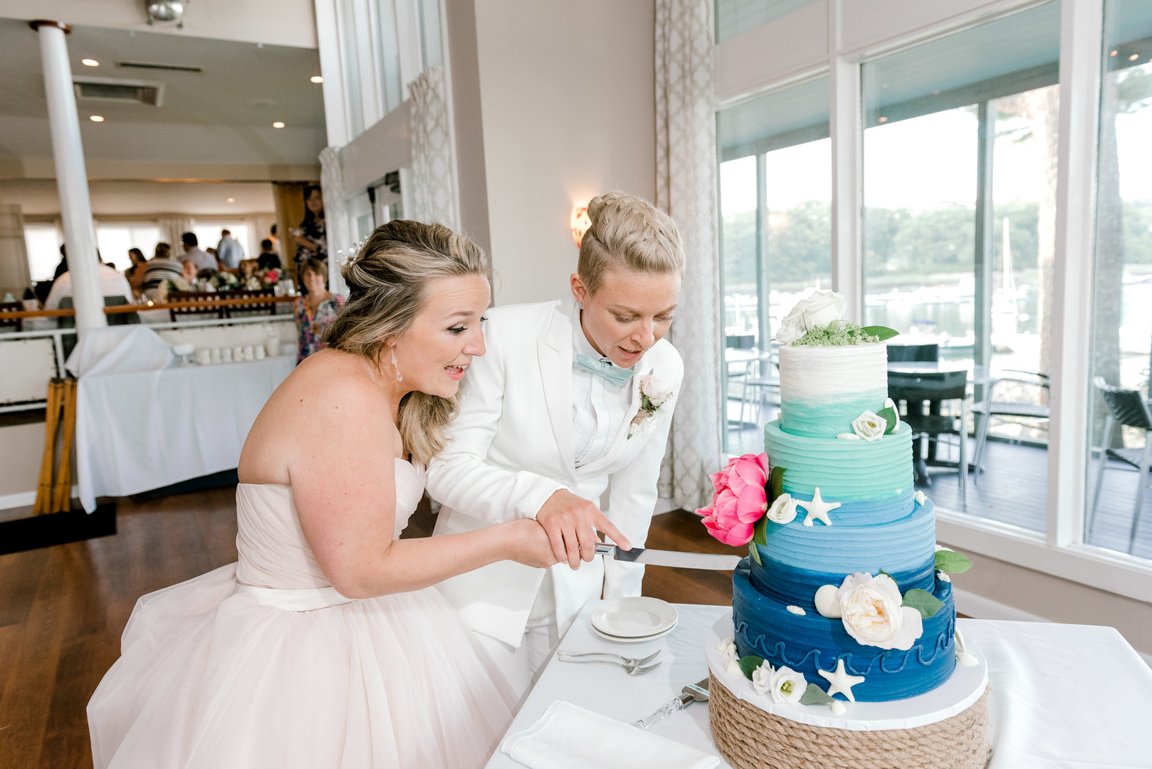 Two brides, a scrapbook proposal, & their sun-drenched nautical Maine wedding