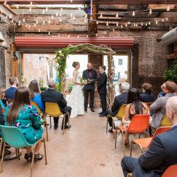 A New York confectionery wedding with smoke bombs, viking horns, & a haunted paintball field