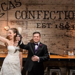 A New York confectionery wedding with smoke bombs, viking horns, & a haunted paintball field