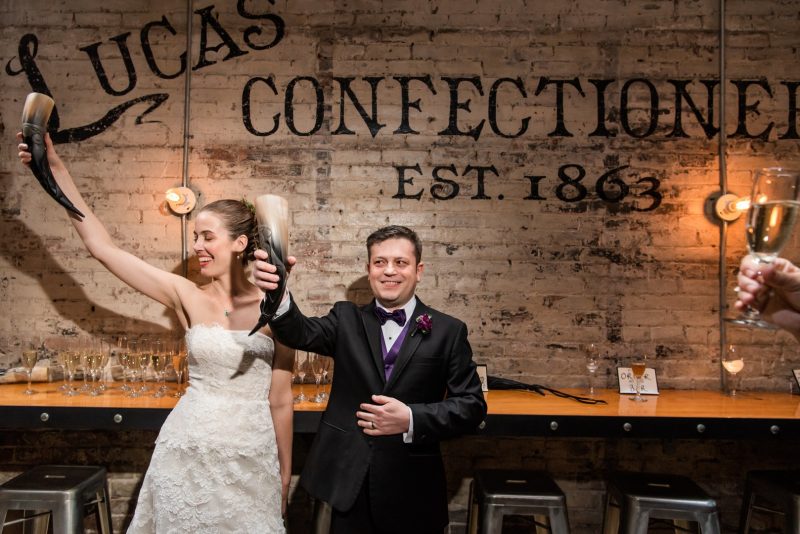 A New York confectionery wedding with smoke bombs, viking horns, & a haunted paintball field