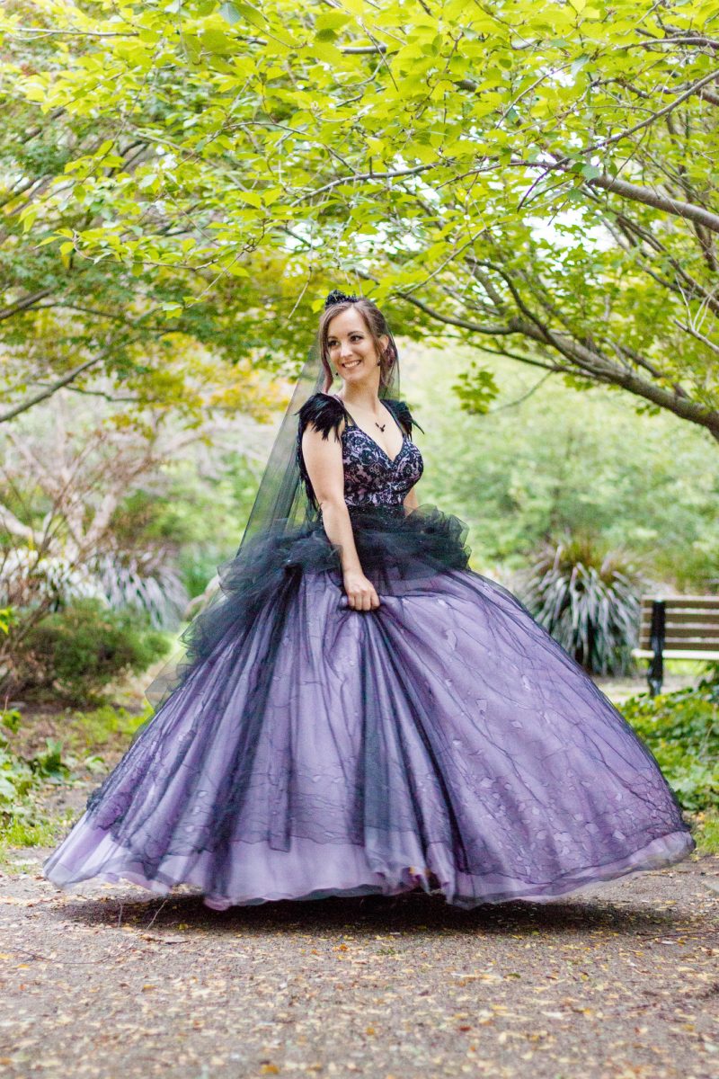 A Hallowedding costume party with a gorgeous purple and black gown