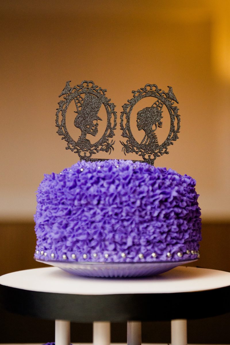 A Hallowedding costume party with a gorgeous purple and black gown