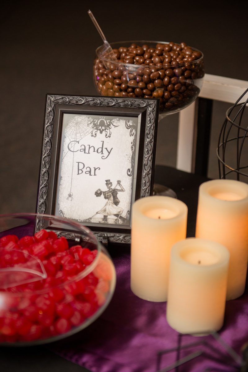 A Hallowedding costume party with a gorgeous purple and black gown