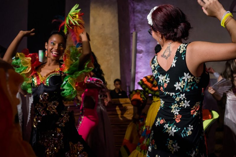 A spectacle of dance & color await at this Caribbean destination wedding in Columbia