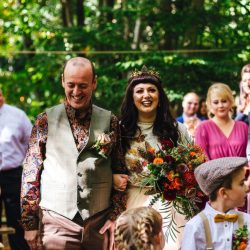 A wild woodland Halloween wedding in Kent with smoke grenades, pumpkins, & an Irish band