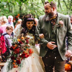 A wild woodland Halloween wedding in Kent with smoke grenades, pumpkins, & an Irish band