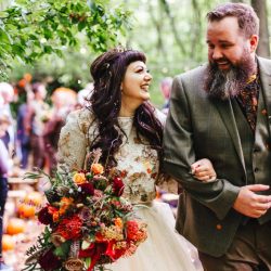 A wild woodland Halloween wedding in Kent with smoke grenades, pumpkins, & an Irish band