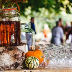 A wild woodland Halloween wedding in Kent with smoke grenades, pumpkins, & an Irish band
