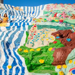 Here's the magic that happens when a quirky couple meets a wild & colorful sculpture garden