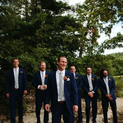 A Maine camp wedding photobombed by the couple's doggo