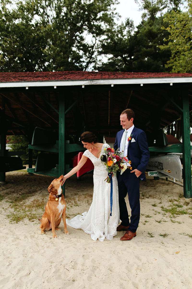 A Maine camp wedding photobombed by the couple's doggo