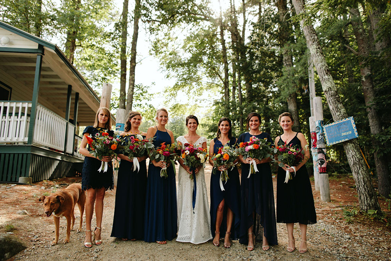 A Maine camp wedding photobombed by the couple's doggo