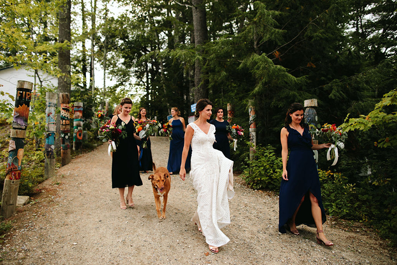 A Maine camp wedding photobombed by the couple's doggo
