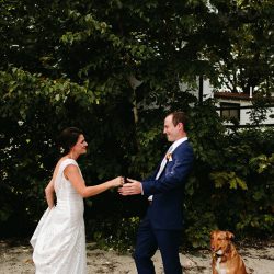 A Maine camp wedding photobombed by the couple's doggo