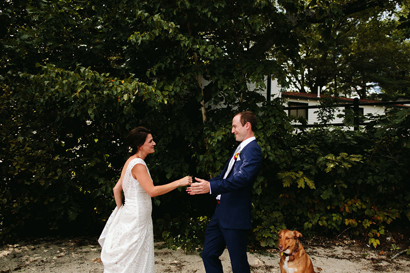 A Maine camp wedding photobombed by the couple's doggo