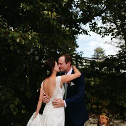 A Maine camp wedding photobombed by the couple's doggo