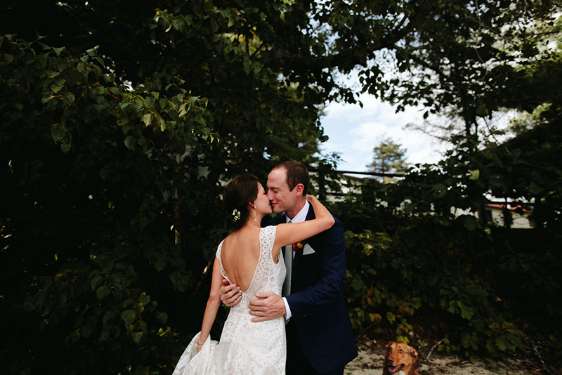 A Maine camp wedding photobombed by the couple's doggo