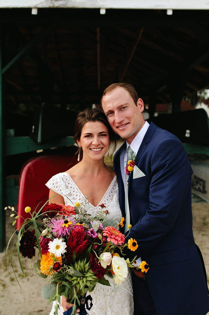 A Maine camp wedding photobombed by the couple's doggo